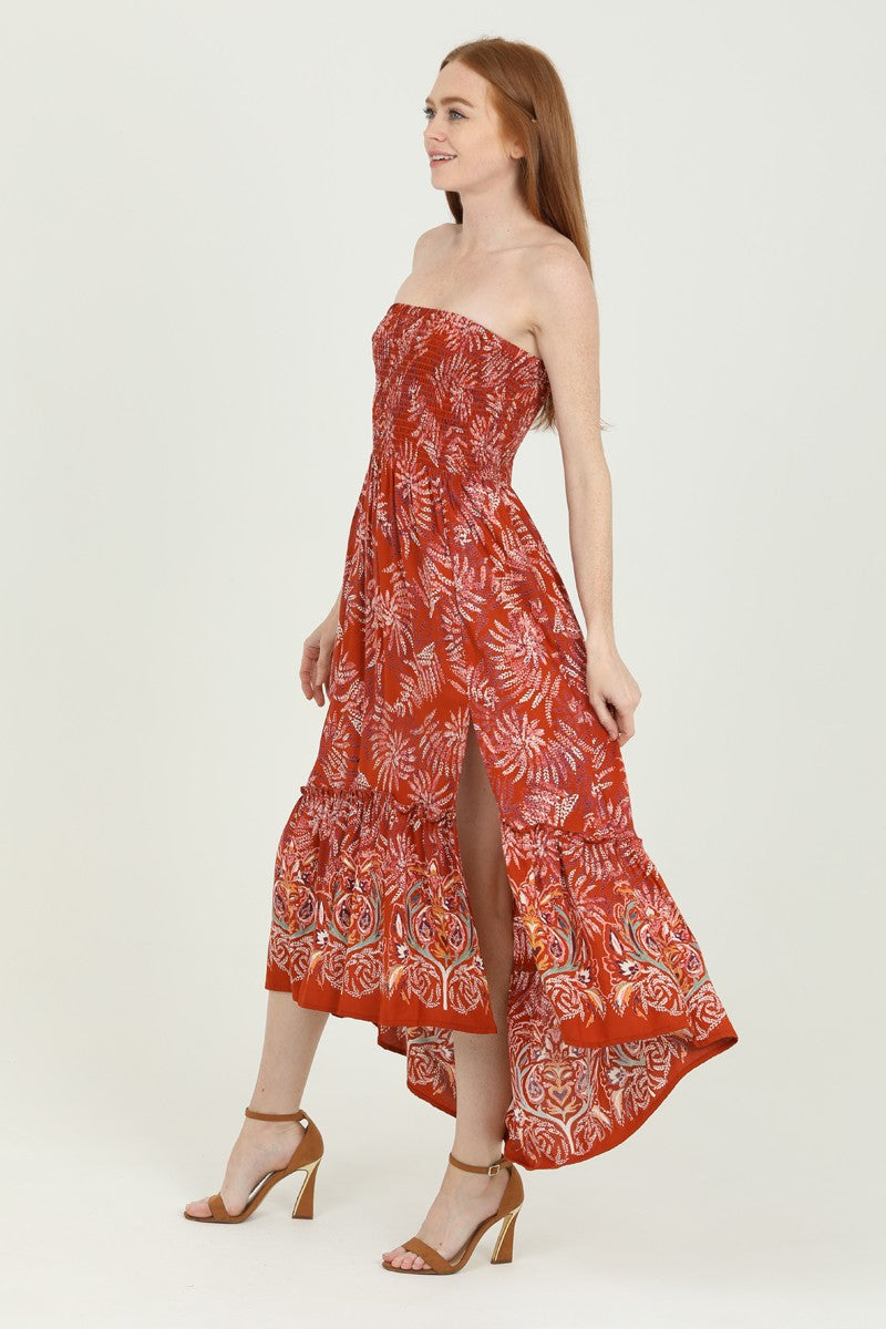 rust-colored smocked maxi dress with a boho print