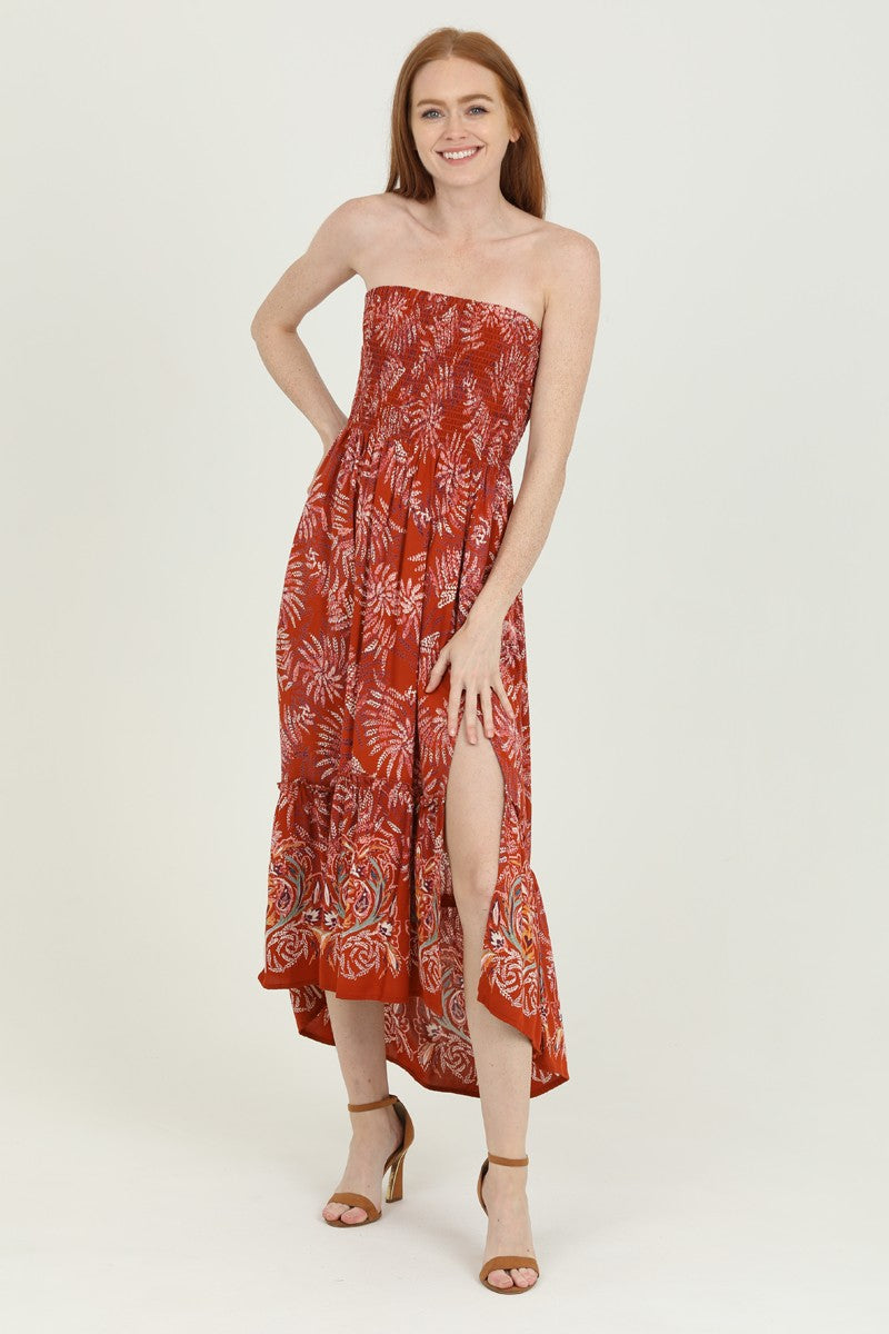rust-colored smocked maxi dress with a boho print