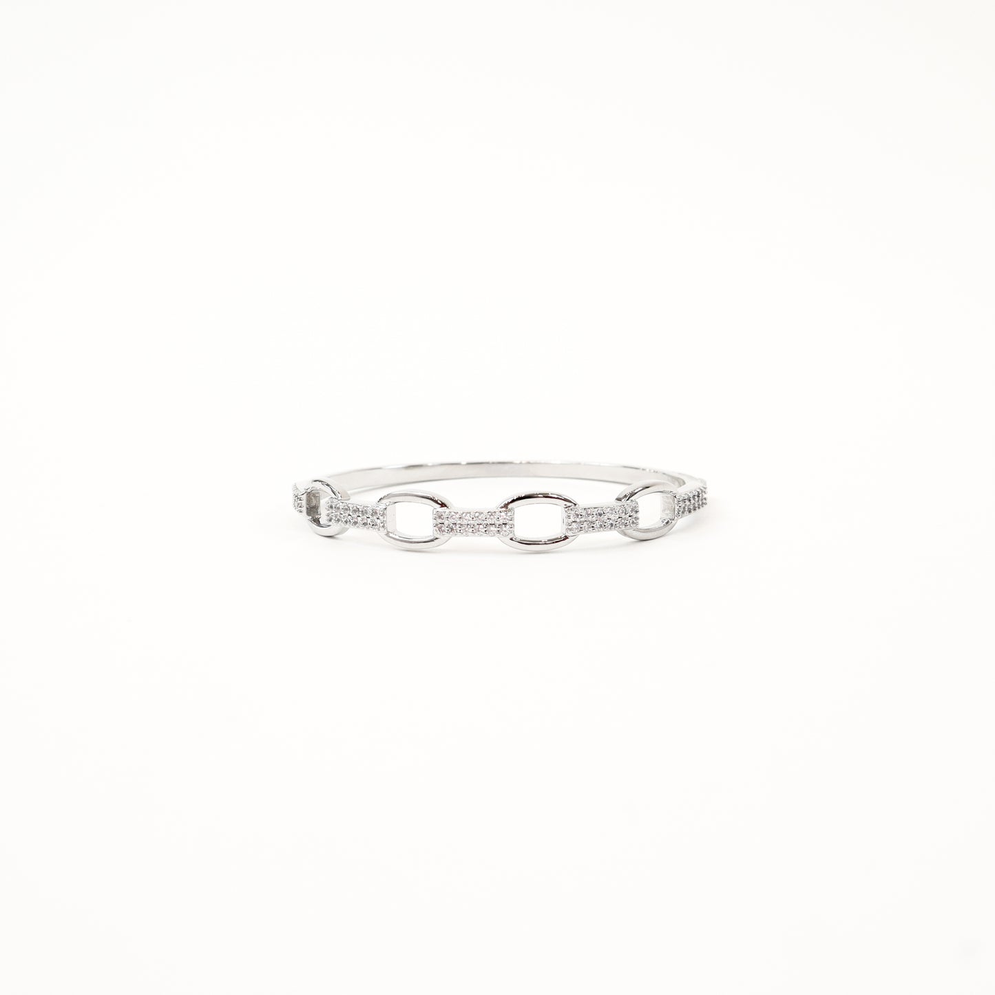 Silver link bracelet with crystal embellishments on a white background