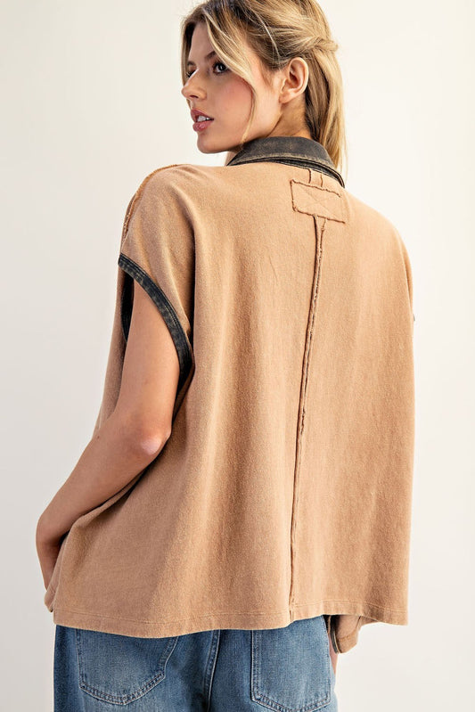 Sleeveless boxy top with contrast collar and sleeve cuffs in a softly washed finish.