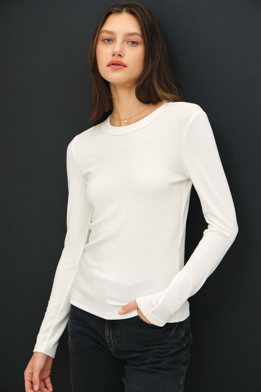 Soft stretch knit pullover with a classic round neck and relaxed slim fit.