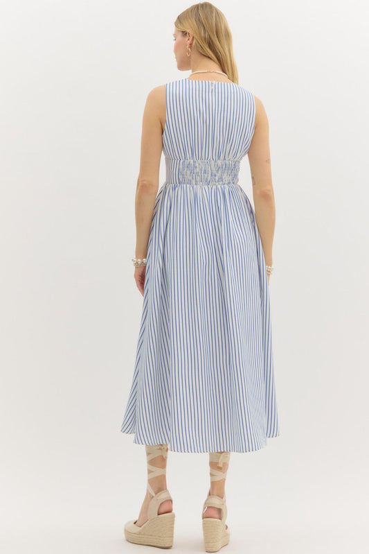 Striped sleeveless midi dress with front bow and smocked back waist.