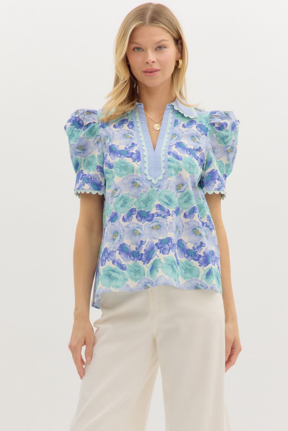 The Annelise top combines vintage-inspired charm with fresh, feminine flair.