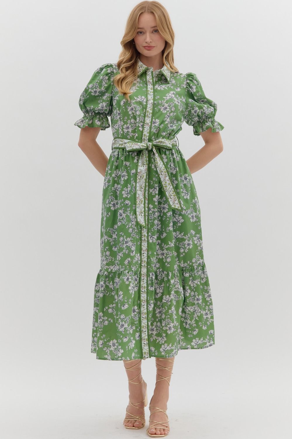 The Beatrice Dress blends romantic florals with modern structure, featuring tiered layers, bubble sleeves, and a crisp contrast collar in breathable cotton.