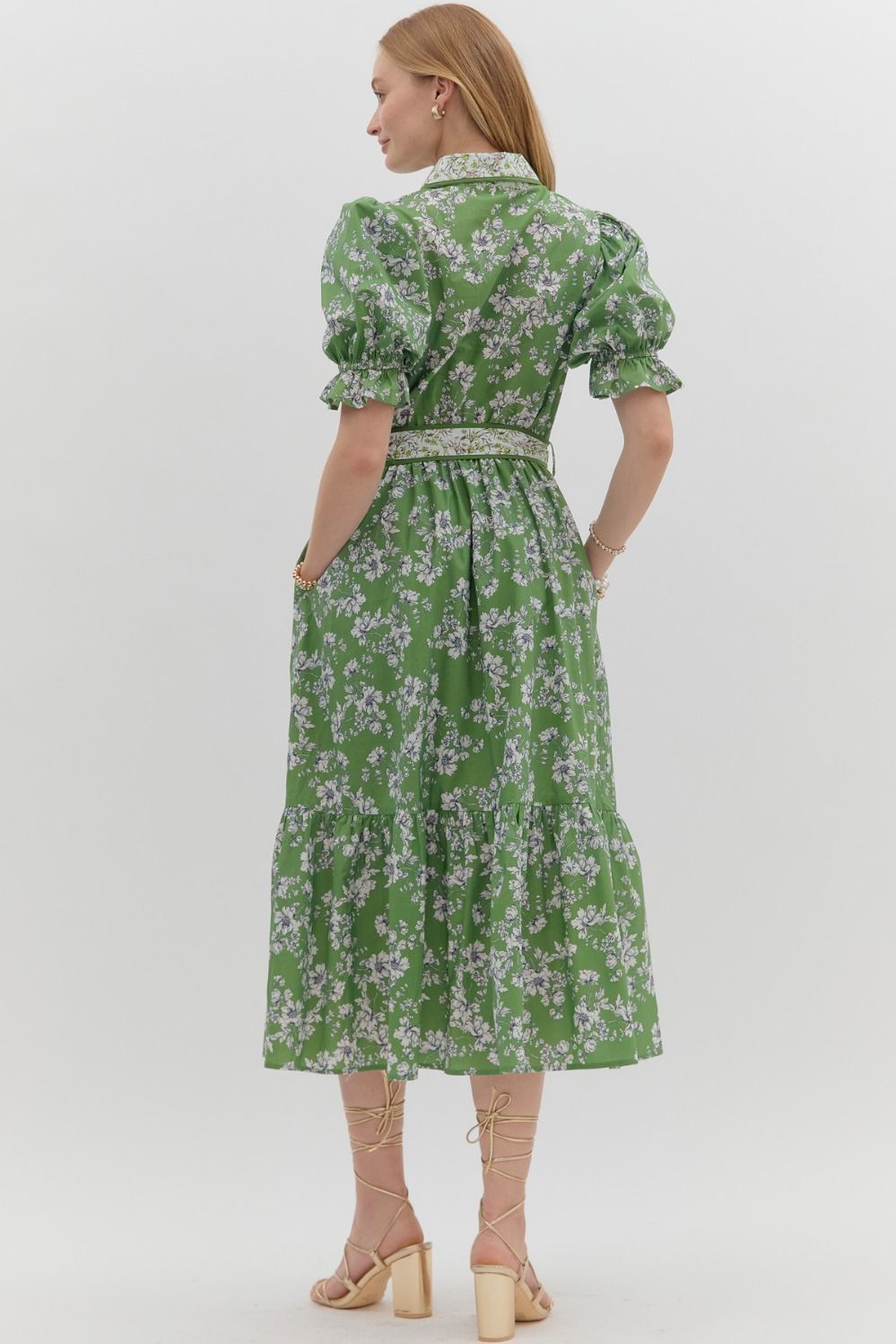 The Beatrice Dress blends romantic florals with modern structure, featuring tiered layers, bubble sleeves, and a crisp contrast collar in breathable cotton.