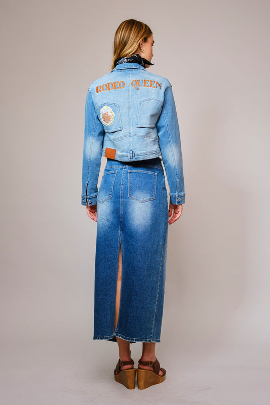 The Effie Jacket is a cropped denim essential with contrast patchwork, Western embroidery, and bold “Rodeo Queen” lettering on the back.