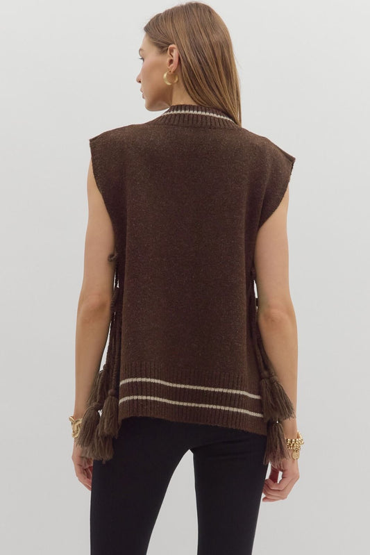 The Elora Vest is a varsity-inspired pullover crafted in soft sweater knit with a relaxed fit—perfect for layering or wearing solo.