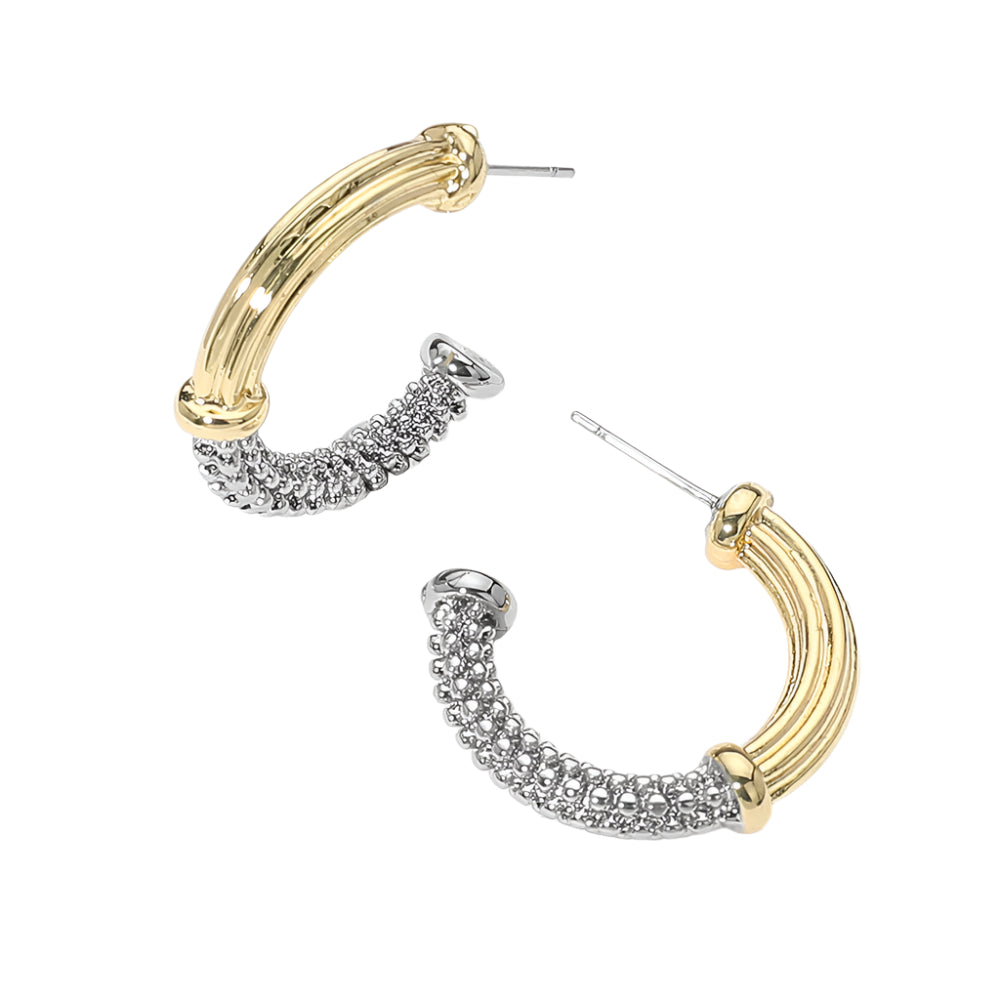 The Isadora Earrings feature bold ribbed texture in a two-tone finish—elevated with 14K gold plating for a touch of everyday elegance.