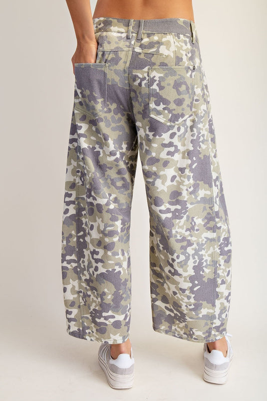 The Janelle Camo Barrel Pants feature bold camo print and panel seam detailing for a utilitarian, modern look.