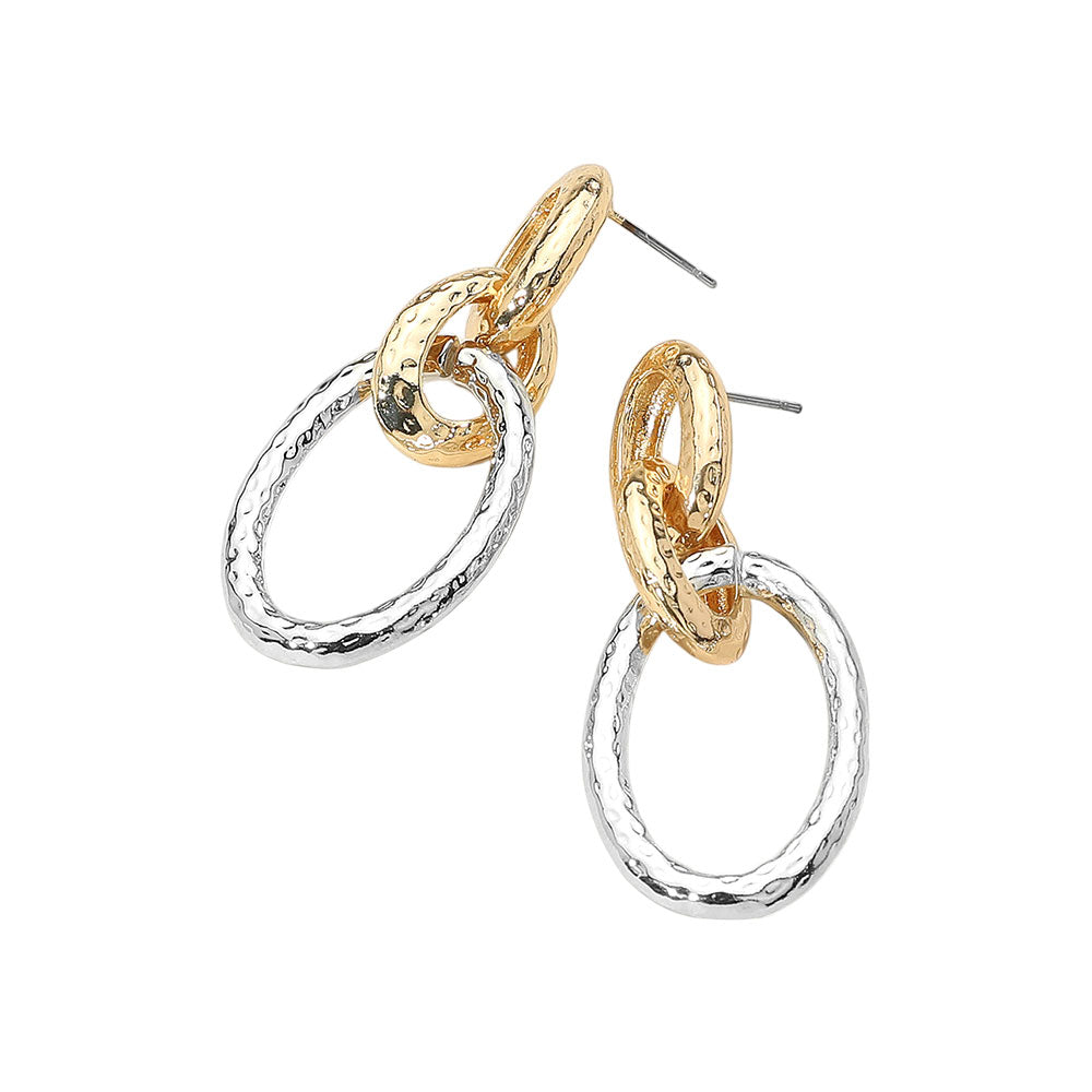 The Nadine Earrings feature elongated metal links with rich texture—perfect for adding modern edge and effortless shine to any outfit.