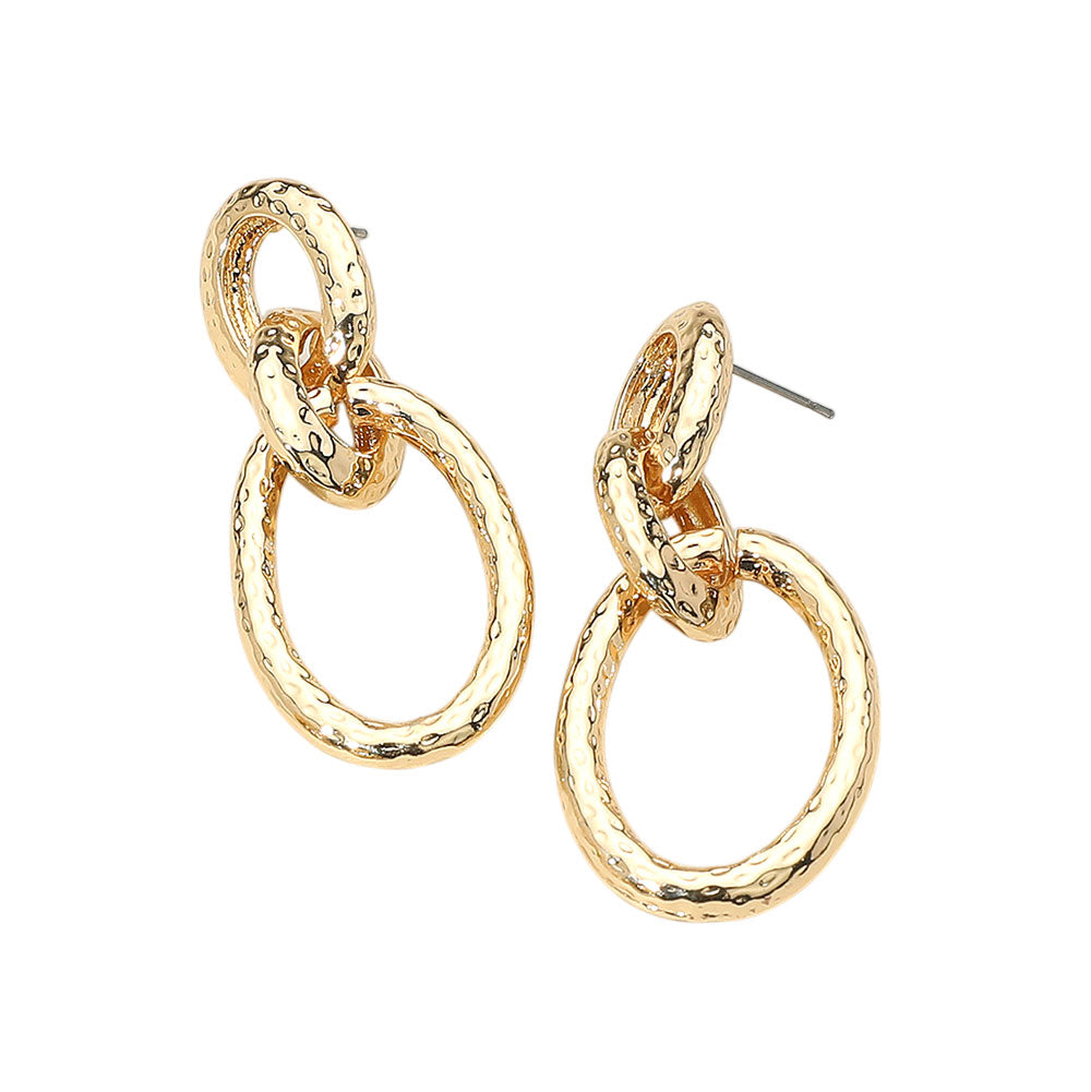 The Nadine Earrings feature elongated metal links with rich texture—perfect for adding modern edge and effortless shine to any outfit.