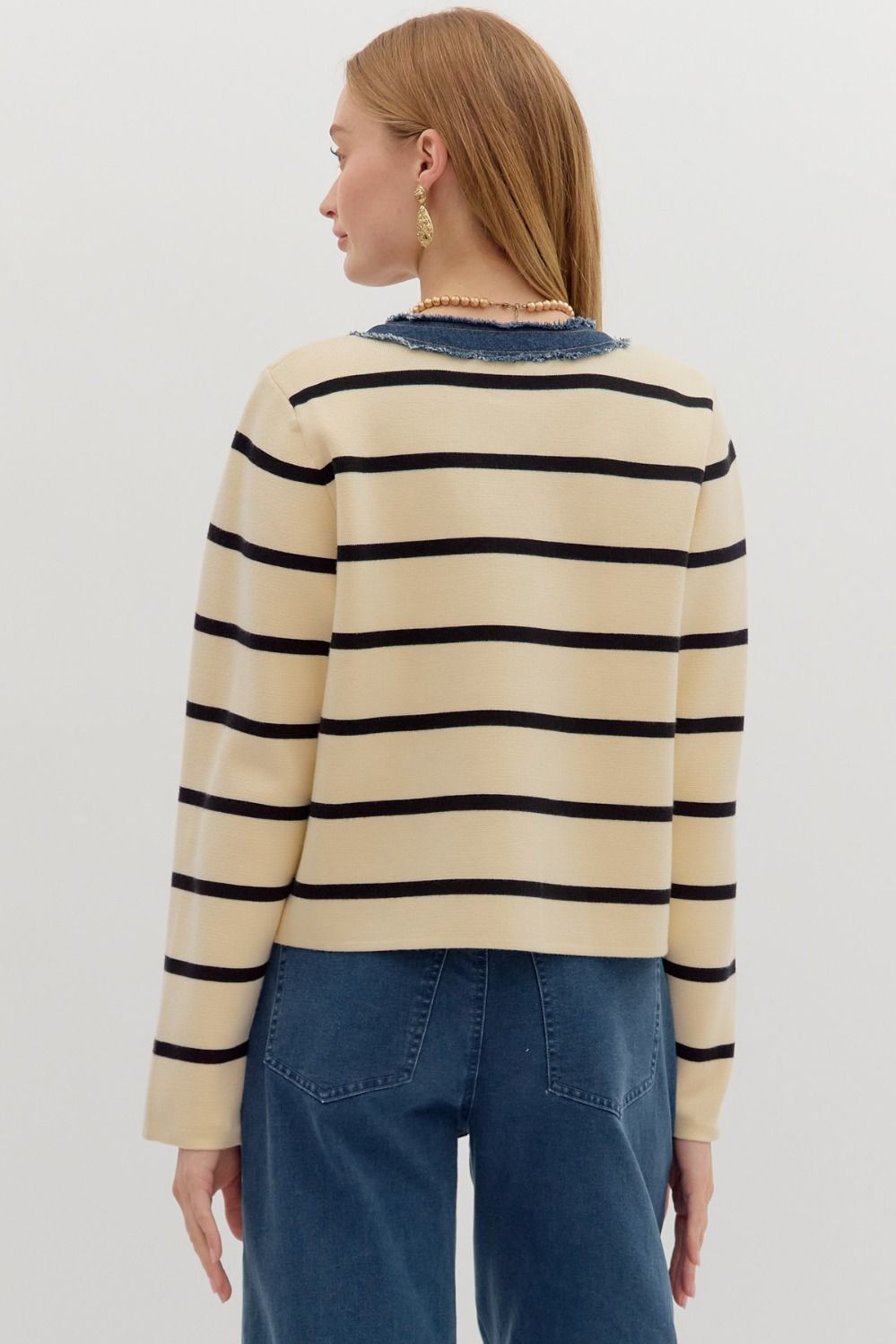 The Odessa Jacket blends cozy knit texture with structured denim contrast—featuring patch pockets, bold stripes, and timeless button-up style.