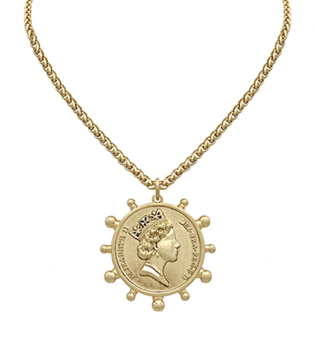 A gold-toned necklace with a substantial chain and a large circular pendant featuring a regal profile, possibly Queen Elizabeth II, encircled by decorative bumps and rimmed with text.