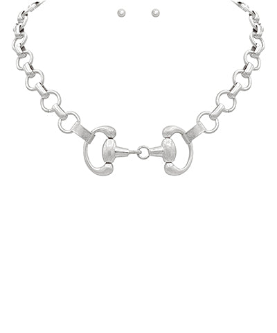 The Vivian Necklace Set features linked horse bit-inspired metal design on a 16" chain with a secure lobster clasp—classic equestrian style for everyday wear.