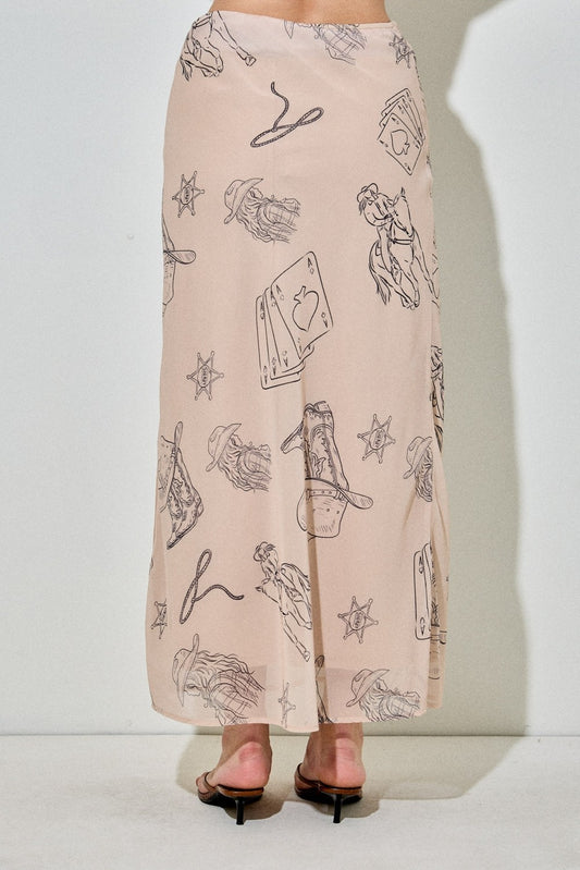 The Winifred is a cowboy print midi skirt with a side slit and zipper, made for bold everyday style with a Western twist.