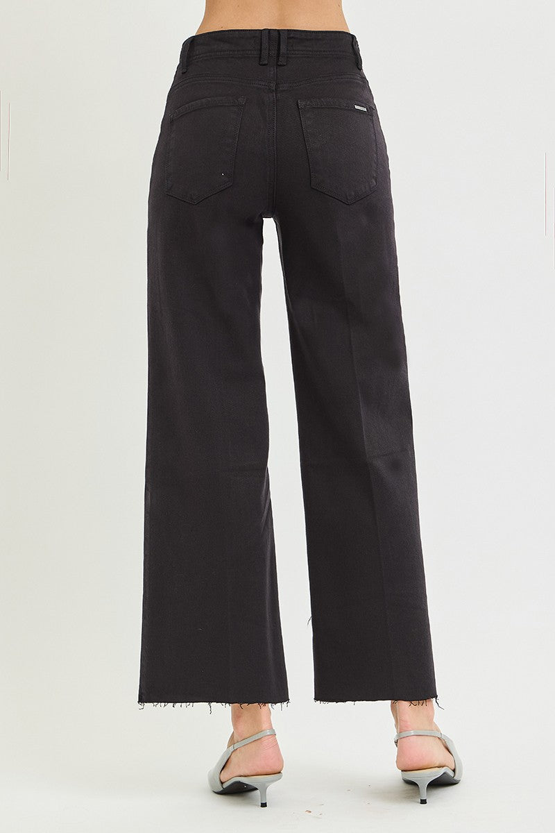 High-rise wide-leg pants with built-in tummy control and crisp crease-line detailing for a smooth, polished silhouette.