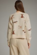 A chic animal print cardigan that brings effortless style and cozy sophistication to everything from denim and boots to polished workwear.