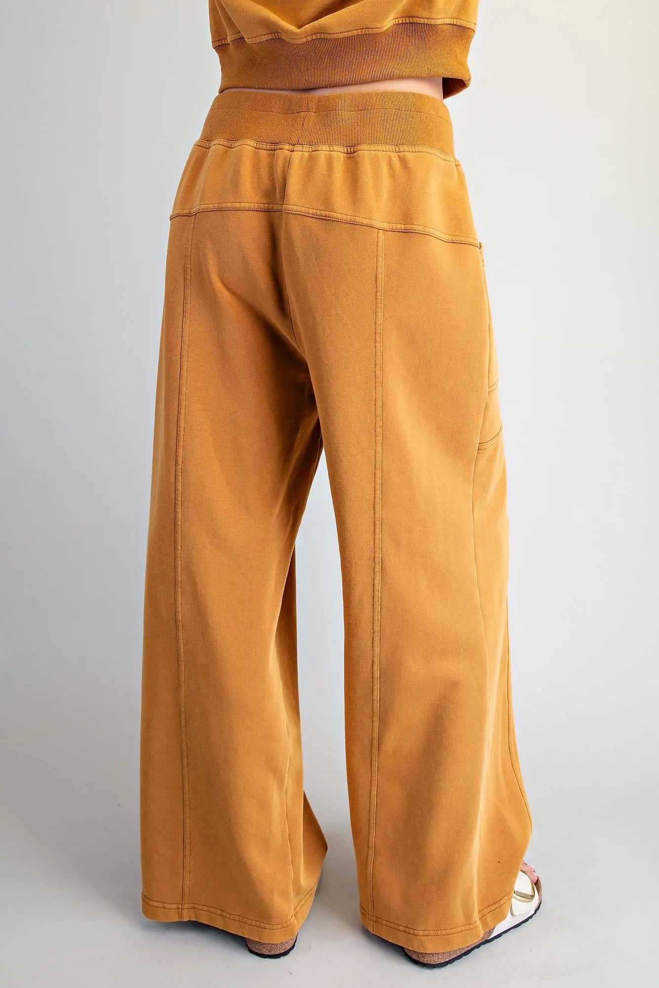 back of wide leg pants with seams down the back of legs
