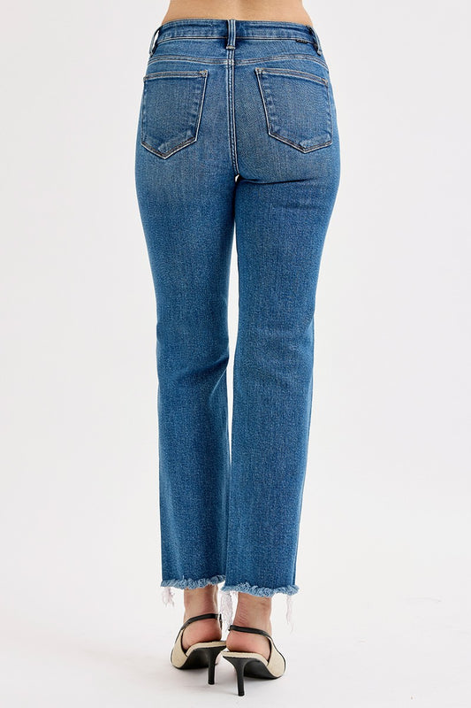 Flattering, modern, and easy to style, these high-rise straight-leg jeans feature tummy control, an ankle-length cut, and a trendy raw hem for an effortlessly cool denim look.
