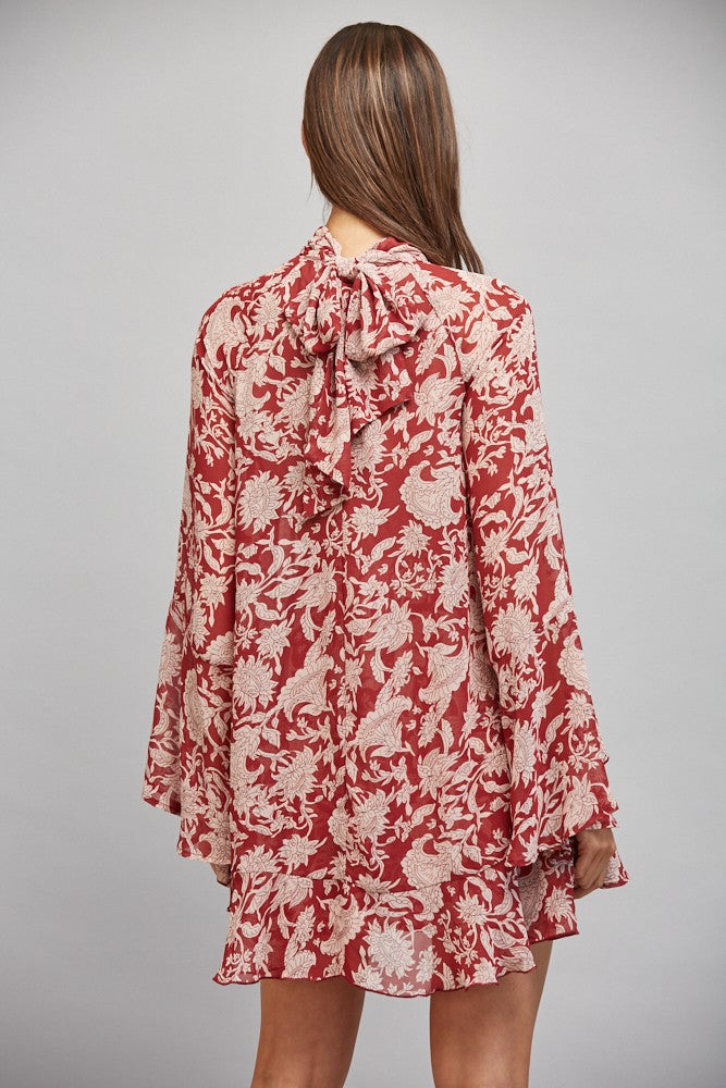 romantic dress that was made to turn heads, a sophisticated high neckline and an elegant tie-back detail, this floral dress offers timeless style with just the right touch of charm.