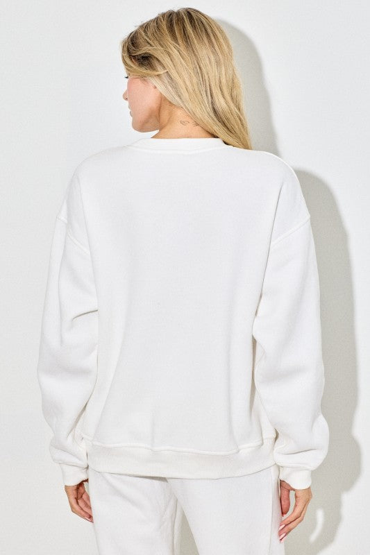 The Tamsin Cowgirl Ski Club Sweatshirt blends Western charm with cozy après-ski comfort.