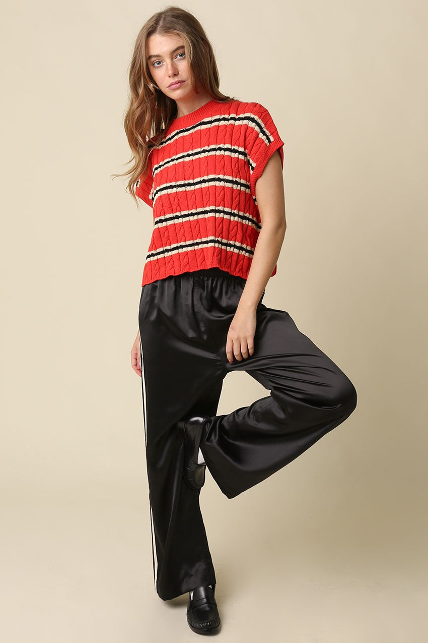 Relaxed straight-leg pants featuring a sporty contrast side stripe, comfortable elastic waistband, and lightweight woven fabric for effortlessly polished everyday style.