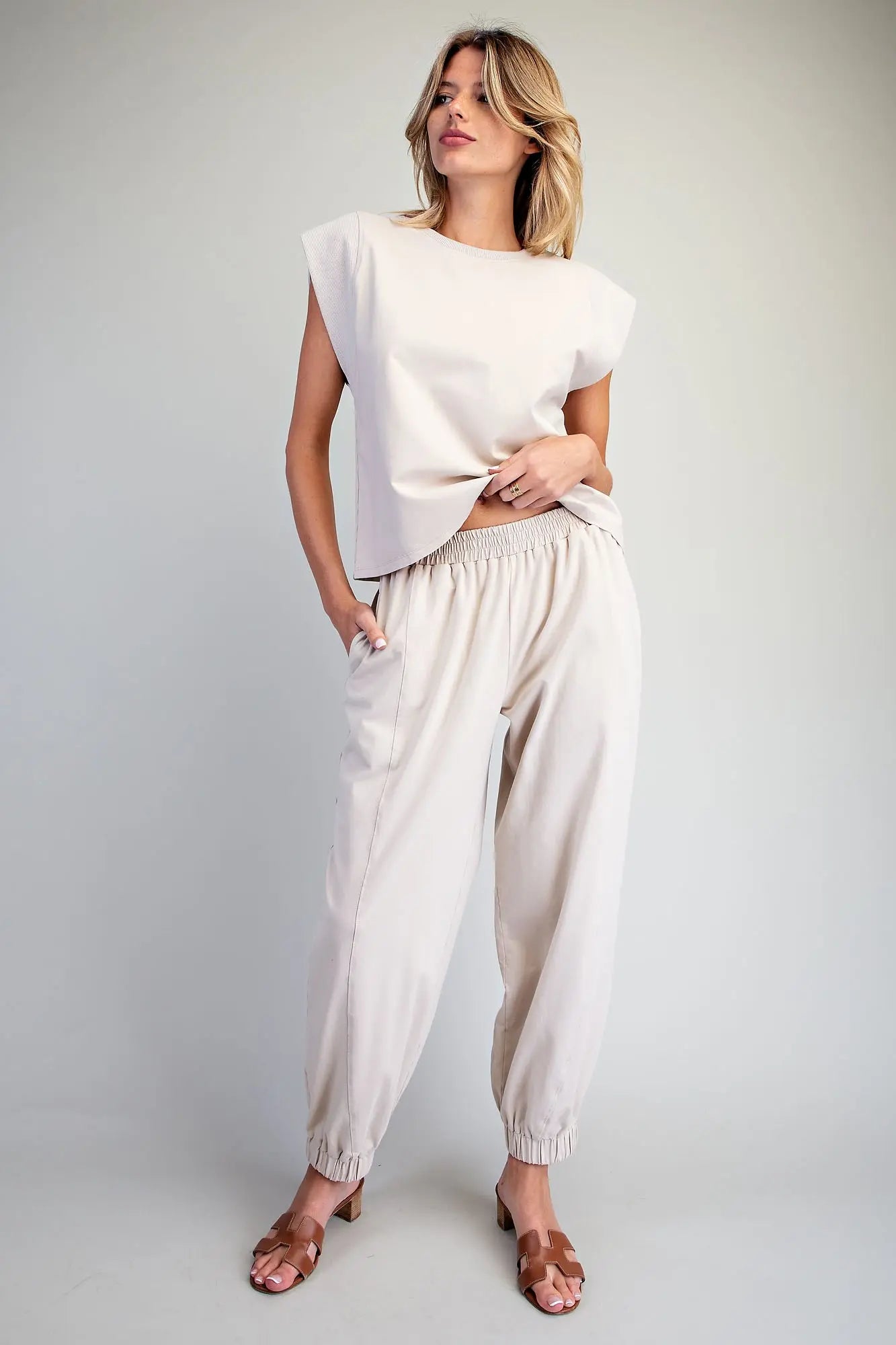 Comfort meets effortless style in these relaxed joggers featuring an elastic waistband, tapered legs, and modern panel detailing.