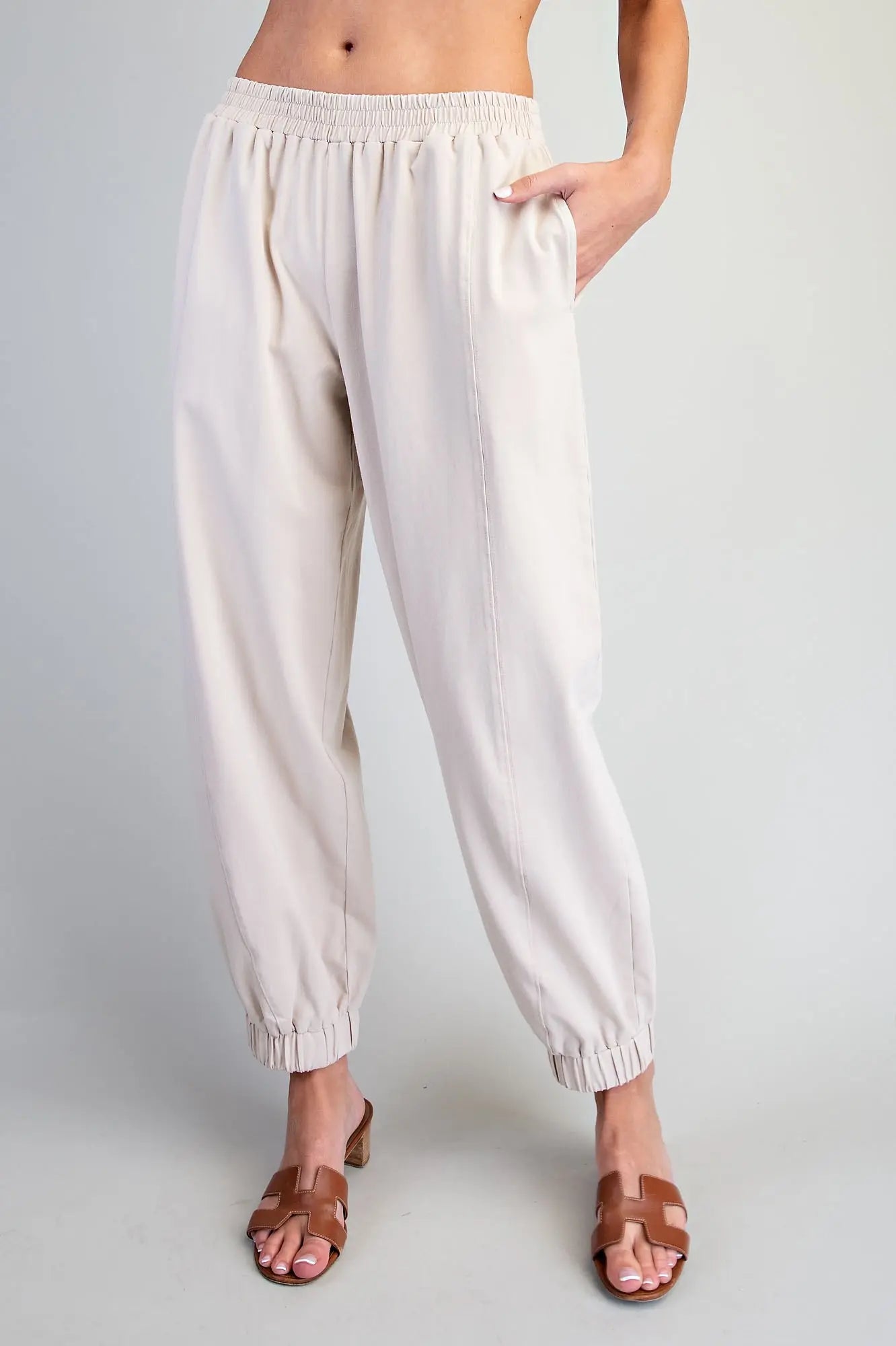Comfort meets effortless style in these relaxed joggers featuring an elastic waistband, tapered legs, and modern panel detailing.
