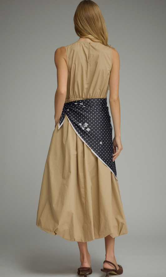 Effortlessly elegant and undeniably unique, the Sable Scarf Dress blends modern sophistication with artistic detail for a statement look you'll love.
