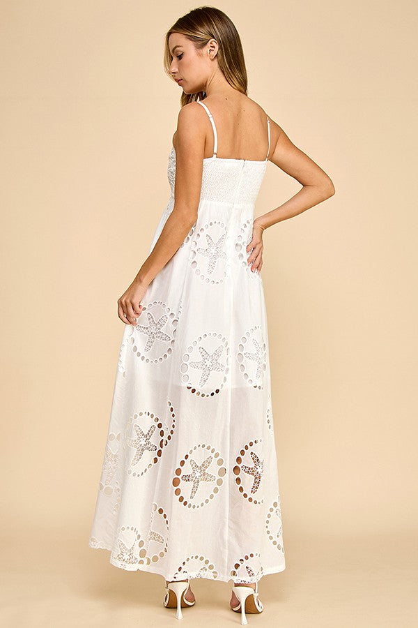 embroidered broderie cotton maxi dress with delicate lace trim and a flowing silhouette