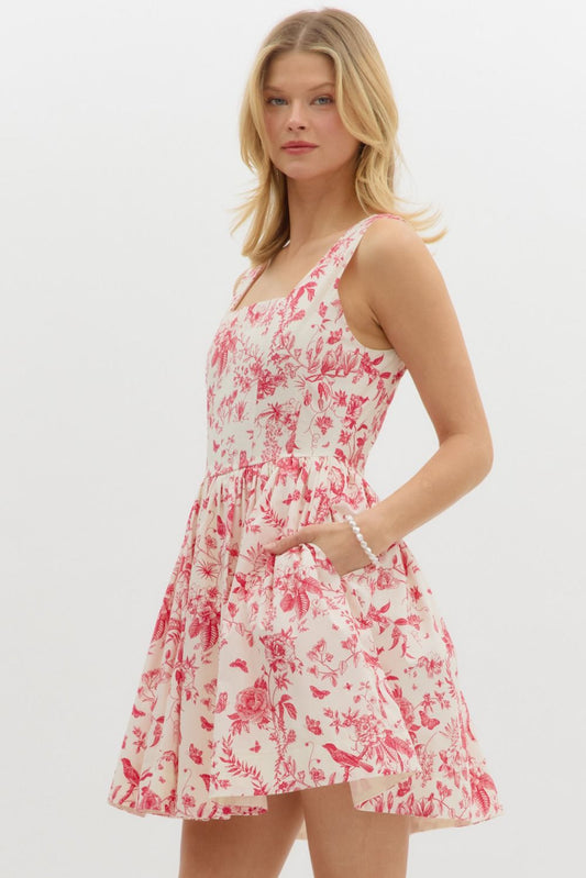 vintage-inspired floral print dress with a fitted bodice and flared skirt."