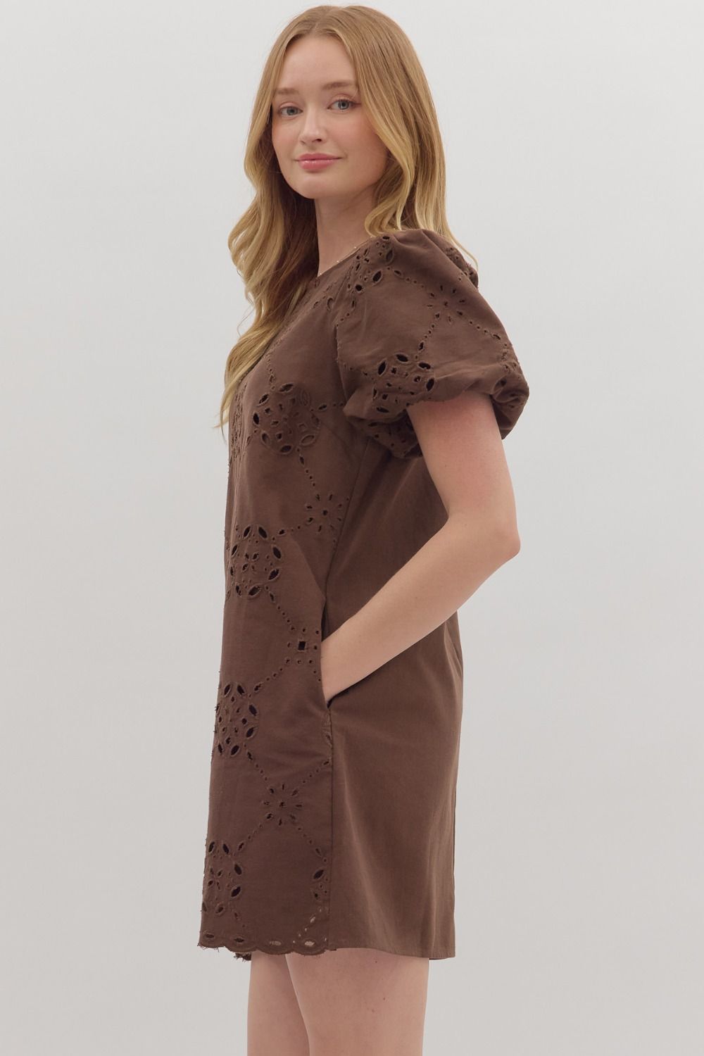 Romantic and refined, the Lenora mini dress charms with puff sleeves, scalloped edges, and timeless eyelet embroidery.