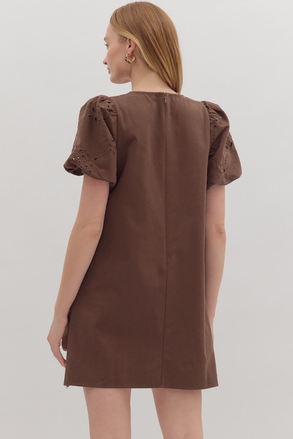 Romantic and refined, the Lenora mini dress charms with puff sleeves, scalloped edges, and timeless eyelet embroidery.