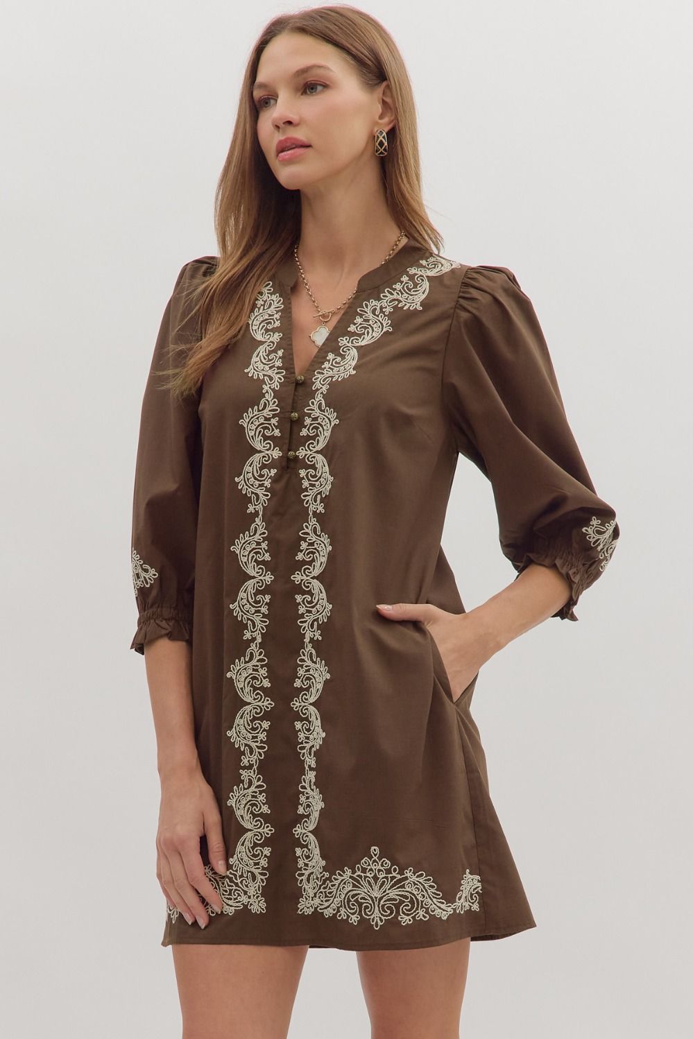 Delicate embroidery and breezy details make the Marcelline mini dress a timeless wardrobe essential.