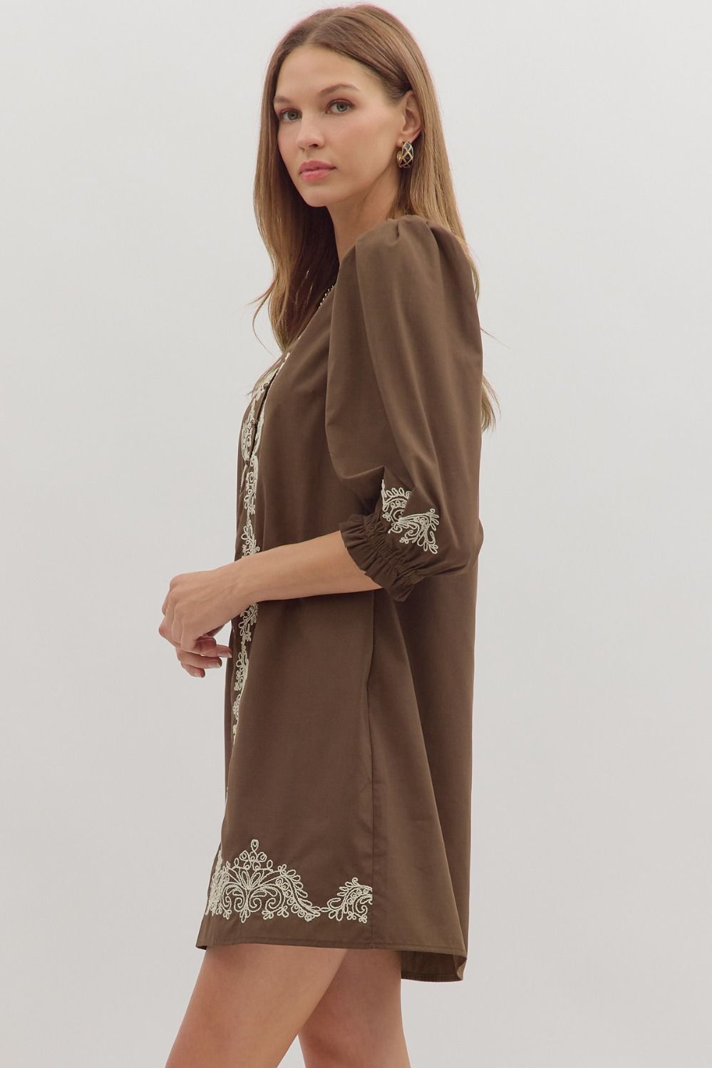 Delicate embroidery and breezy details make the Marcelline mini dress a timeless wardrobe essential.