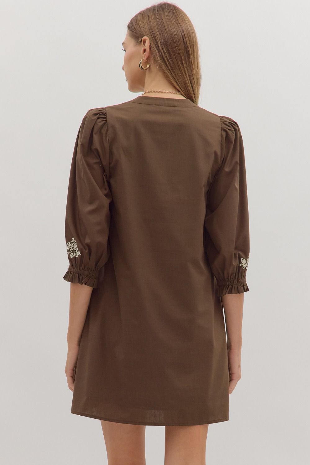 Delicate embroidery and breezy details make the Marcelline mini dress a timeless wardrobe essential.