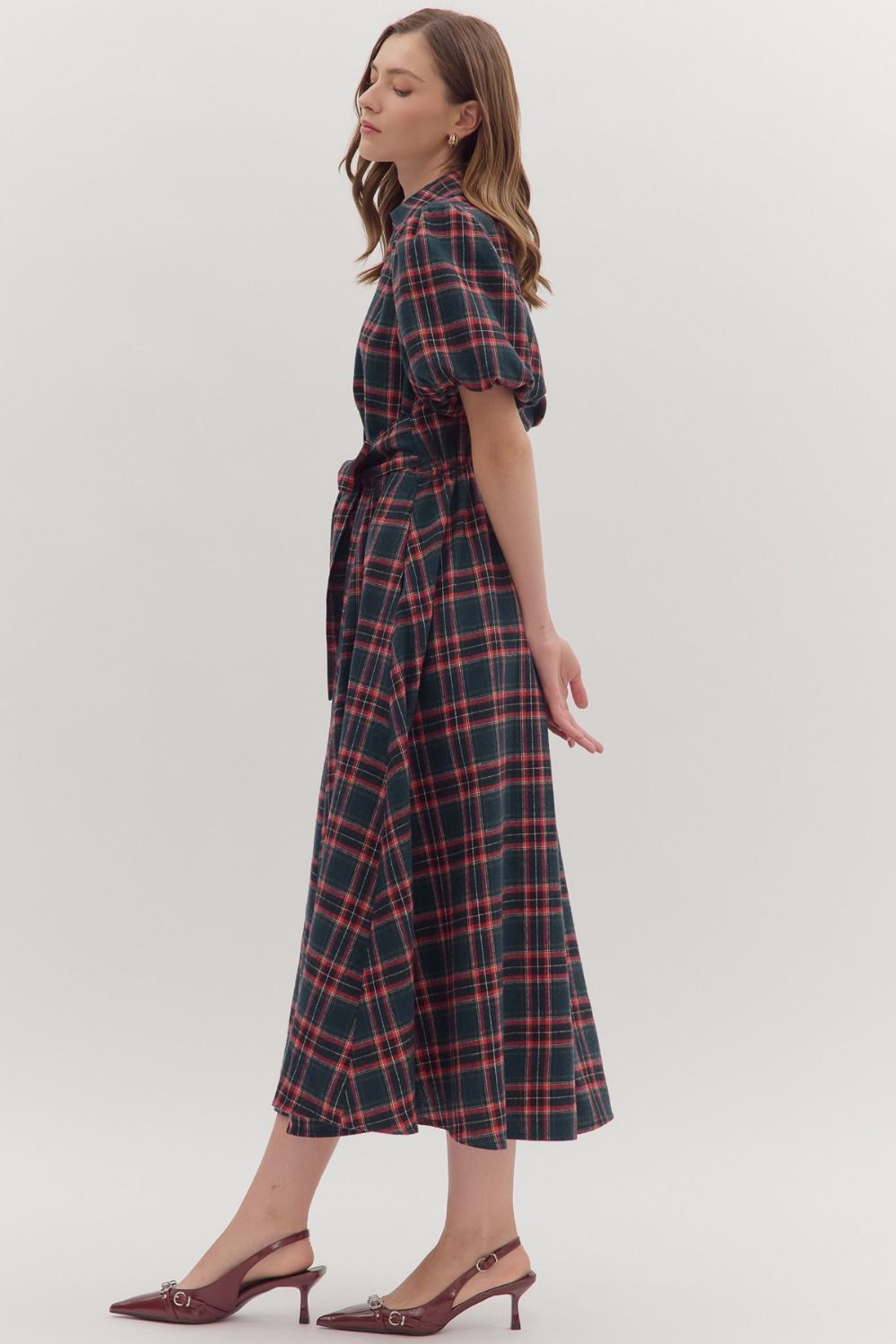 Classic plaid meets modern romance in the Isolde midi dress, complete with puff sleeves, a self-tie belt, and side pockets.
