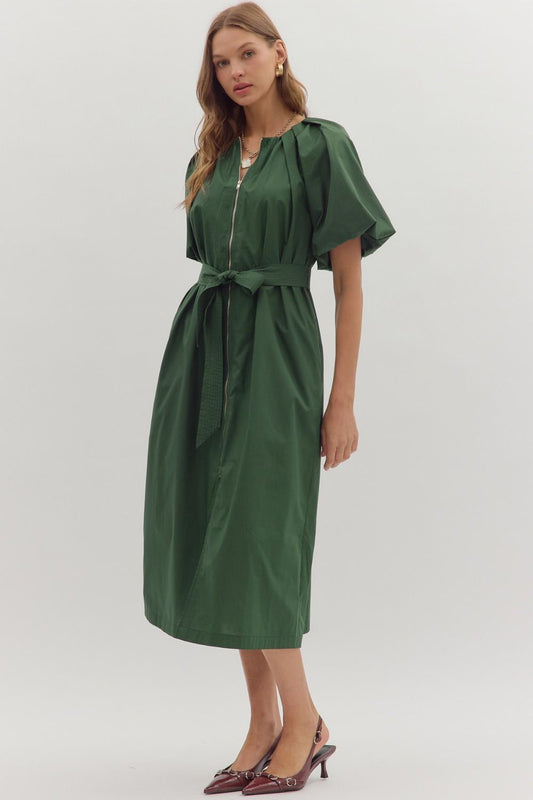 Elegant and versatile, the Odette dress features a gathered neckline, puff sleeves, and a removable self-tie belt for a flattering fit.