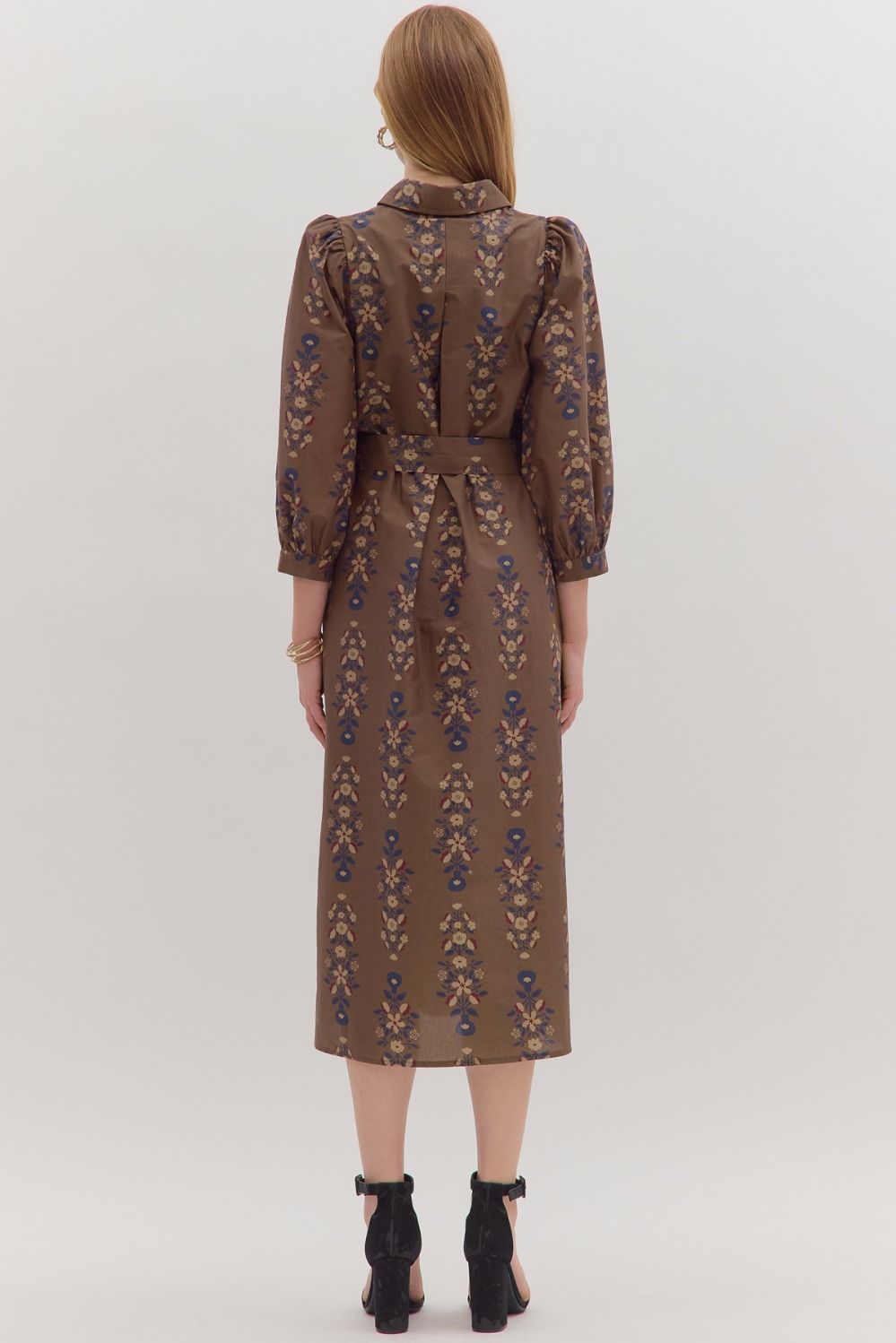 Effortlessly feminine, the Cecily midi dress pairs a botanical print with puff sleeves, a detachable waist tie, and timeless everyday ease.