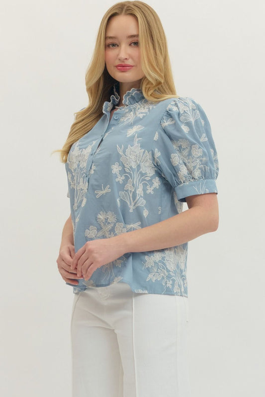 cotton top with embroidered detailing, scalloped mock neck, and short puff sleeves