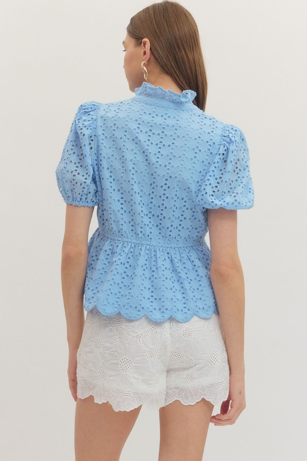 cotton top with puff sleeves, eyelet embroidery, ruffled V-neck, and scallop-trimmed hem