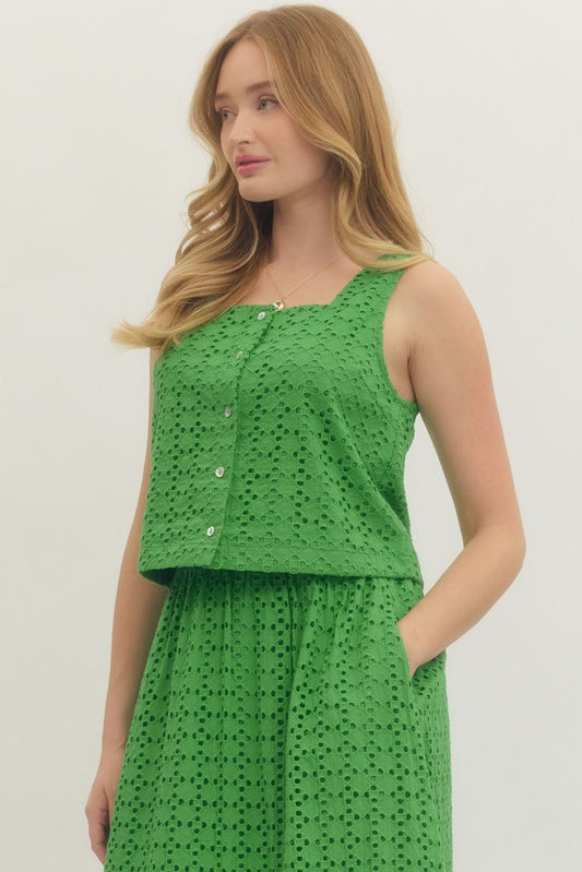 cotton eyelet sleeveless top with button-front closure and a clean, feminine finish