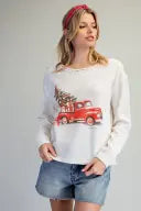 The Martha Christmas Red Truck Waffle Knit Top brings festive charm to cozy-season dressing with a classic holiday truck graphic and textured waffle knit.