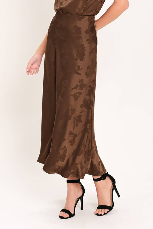 Elevate your wardrobe with this sophisticated jacquard midi skirt featuring a flattering silhouette, stretch comfort, and a sleek back zipper closure.