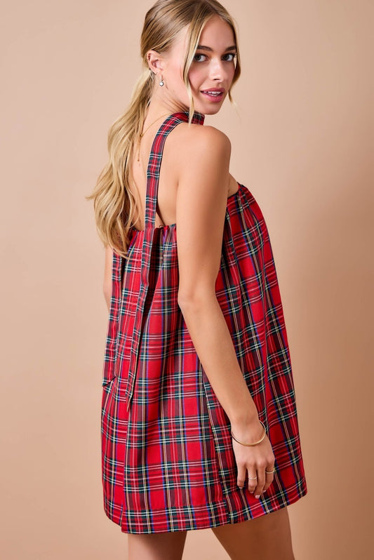 Celebrate the season in style with this festive holiday plaid strapless mini dress, complete with a matching scarf for a coordinated holiday look.