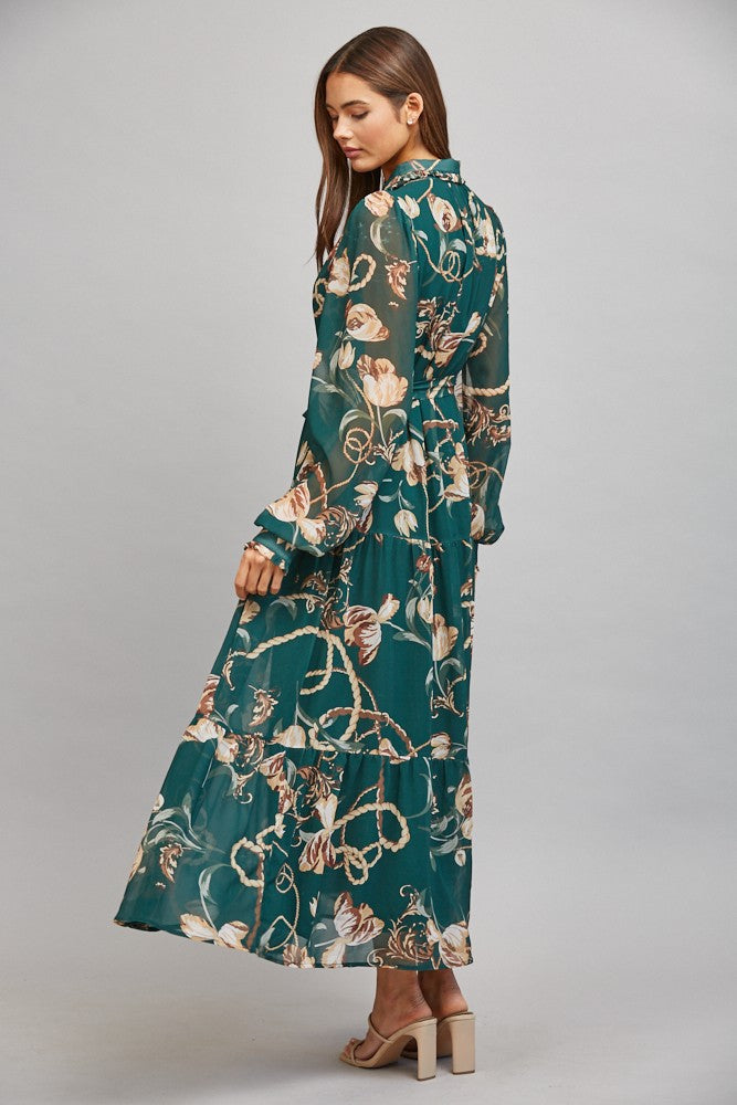 The Loretta Floral Chain Print Midi Dress combines an elegant mixed print with a flattering self-tie waist and breezy chiffon for effortlessly feminine style.