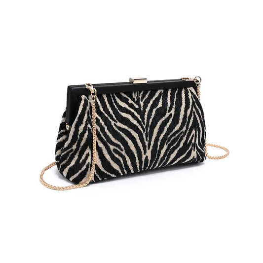 A statement-making zebra jacquard frame clutch with a structured silhouette and chain strap that adds instant polish to any evening look.