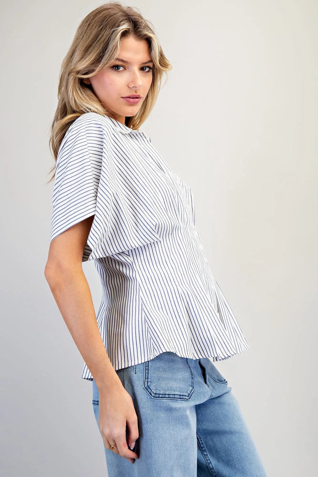 Striped pleated button down top with peplum hem