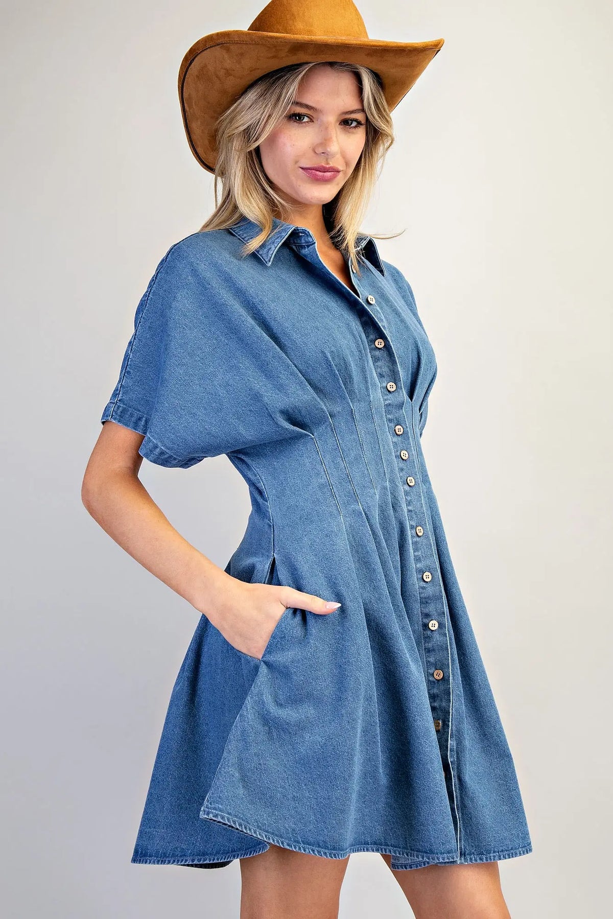 Women’s denim mini dress with pleated waist and flared skirt