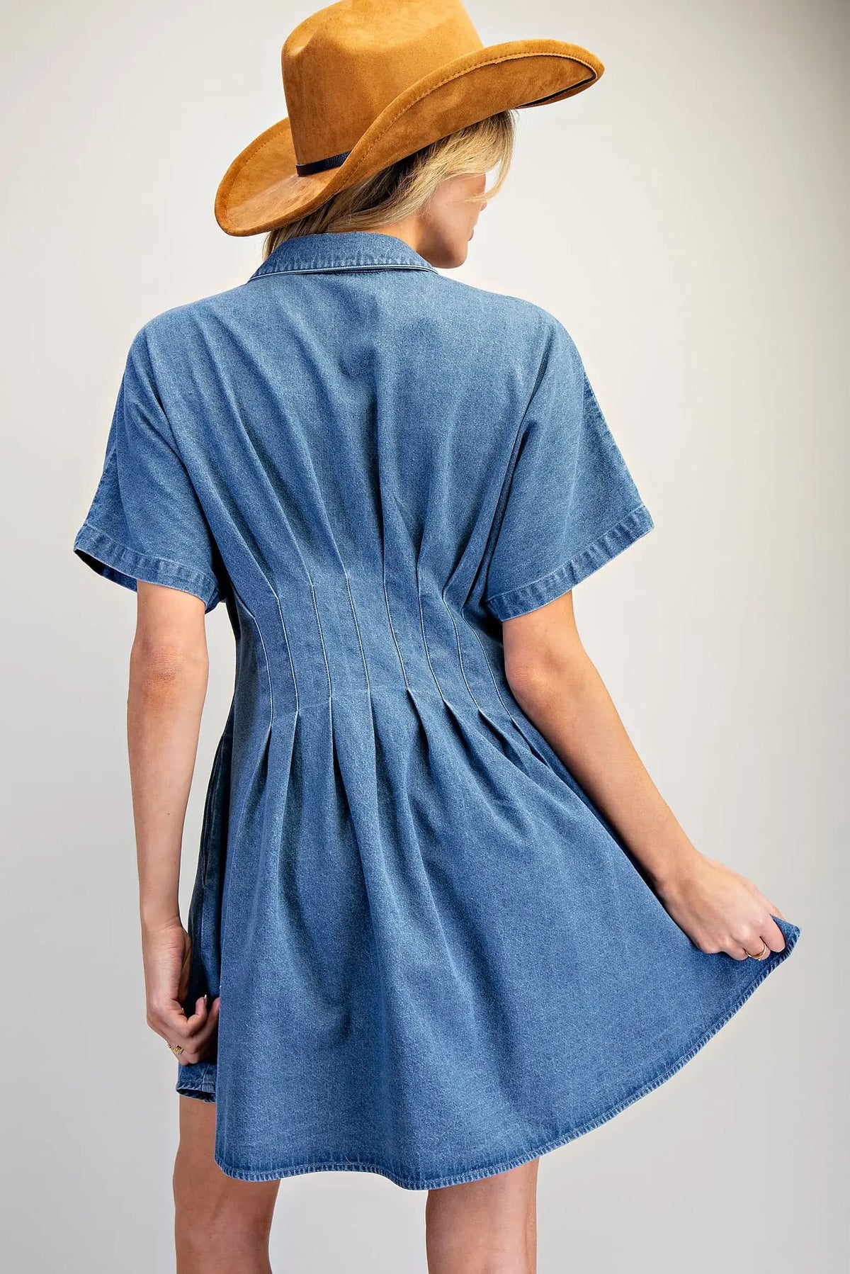 Women’s denim mini dress with pleated waist and flared skirt